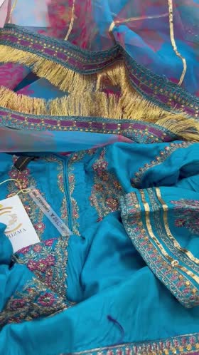 Rs 14500  Charizma stitched raw silk Emb 3 of ( large)